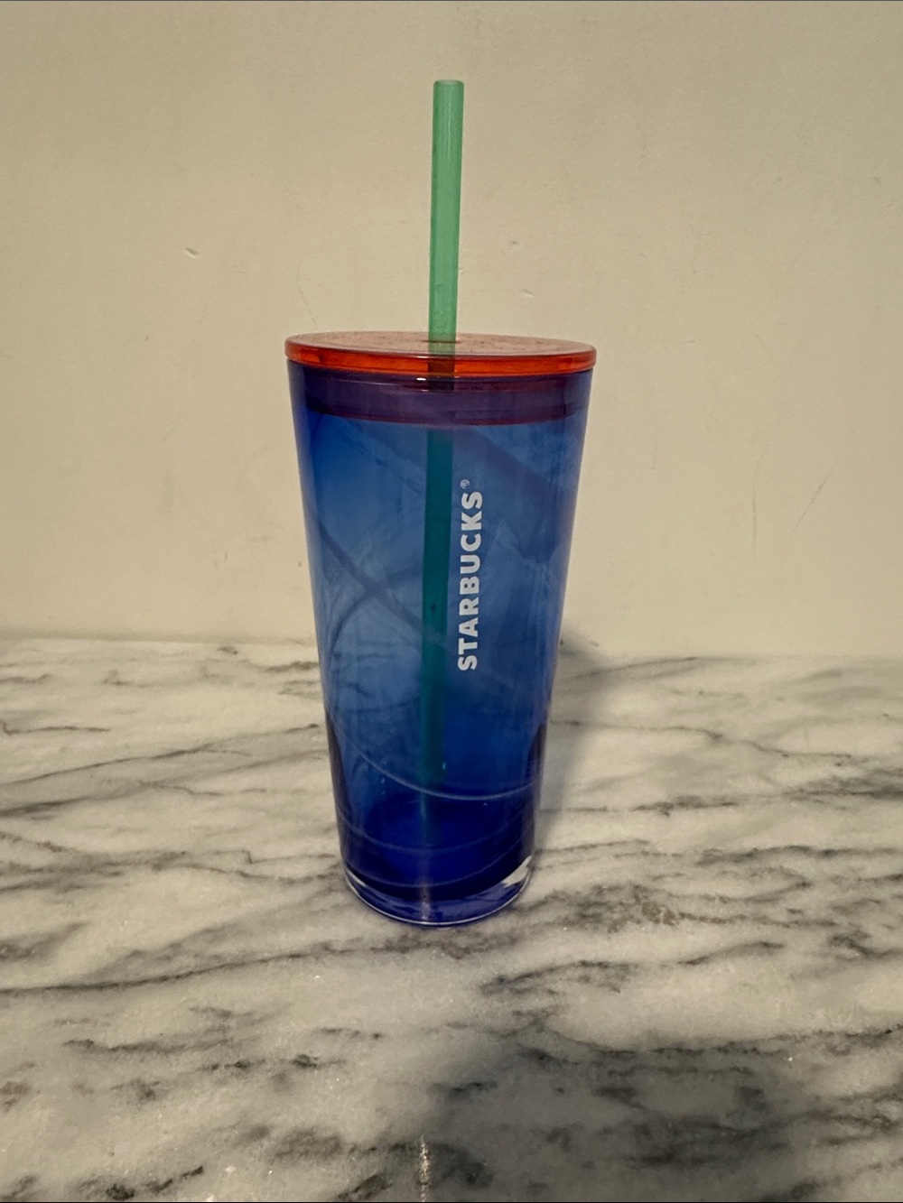 Starbucks Blue Tumbler with Orange Lid and Green Straw